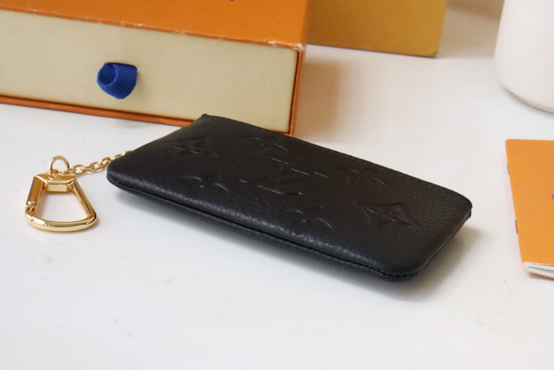 Louis Vuitton 25S Card Holder Recto Verso 12 in Black Monogram Empreinte Embossed Calfskin
