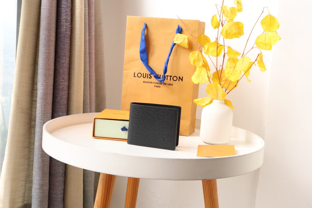 Louis Vuitton 25S Slender Wallet 11 in Black Taiga Calfskin
