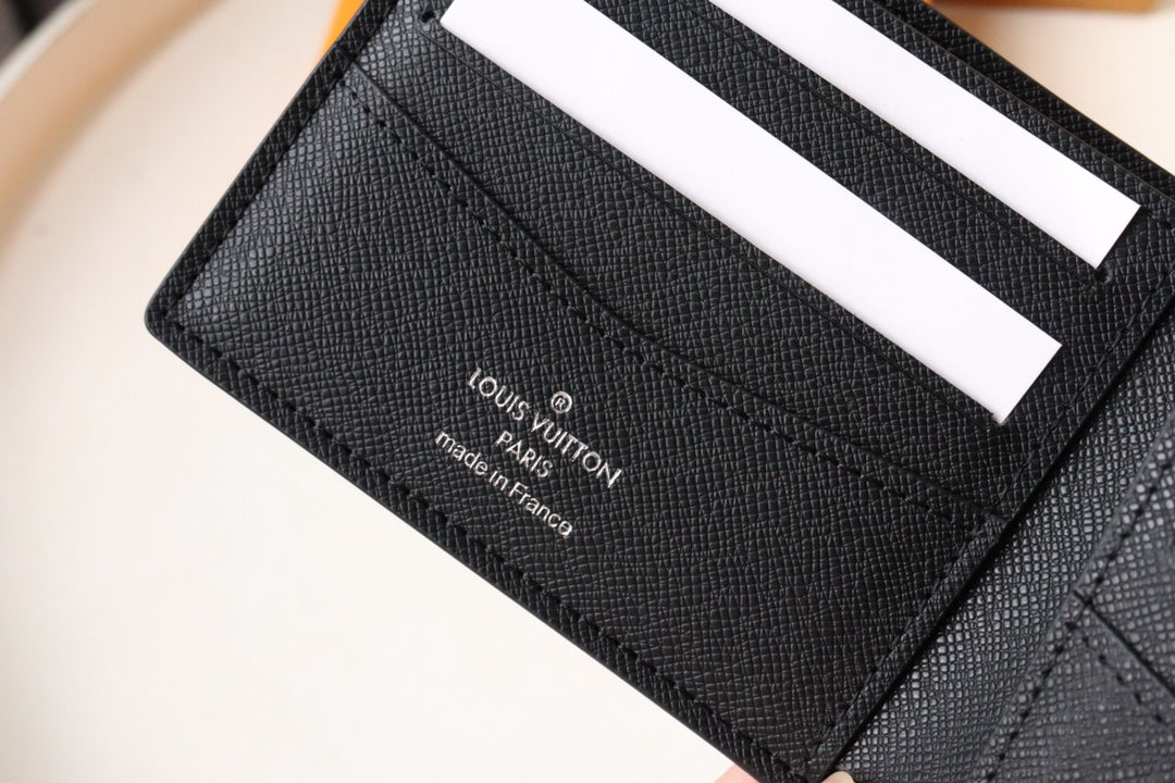 Louis Vuitton 25S Slender Wallet 11 in Black Taiga Calfskin