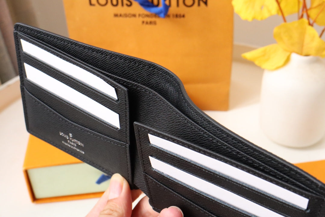 Louis Vuitton 25S Slender Wallet 11 in Black Taiga Calfskin