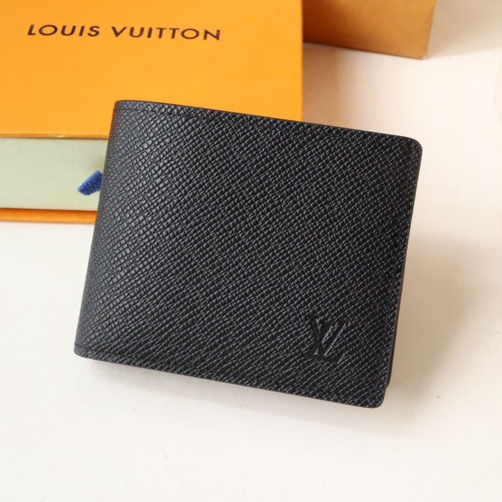 Louis Vuitton 25S Slender Wallet 11 in Black Taiga Calfskin