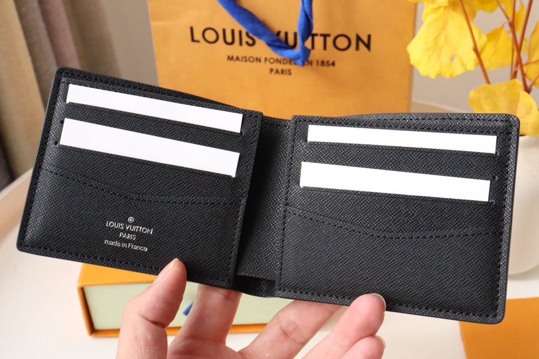 Louis Vuitton 25S Slender Wallet 11 in Black Taiga Calfskin