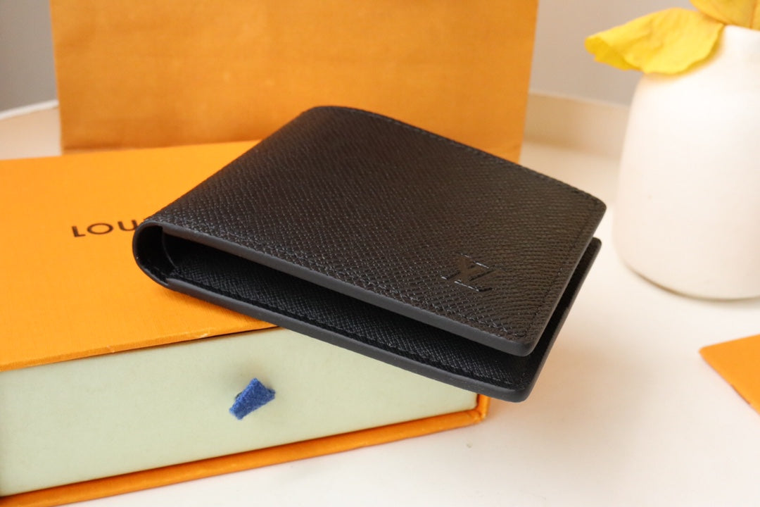 Louis Vuitton 25S Slender Wallet 11 in Black Taiga Calfskin