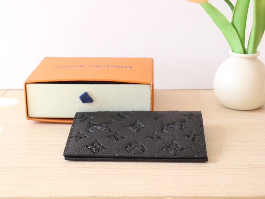 Louis Vuitton 25S Passport Holder 14 in Black Embossed Monogram Shadow Calfskin