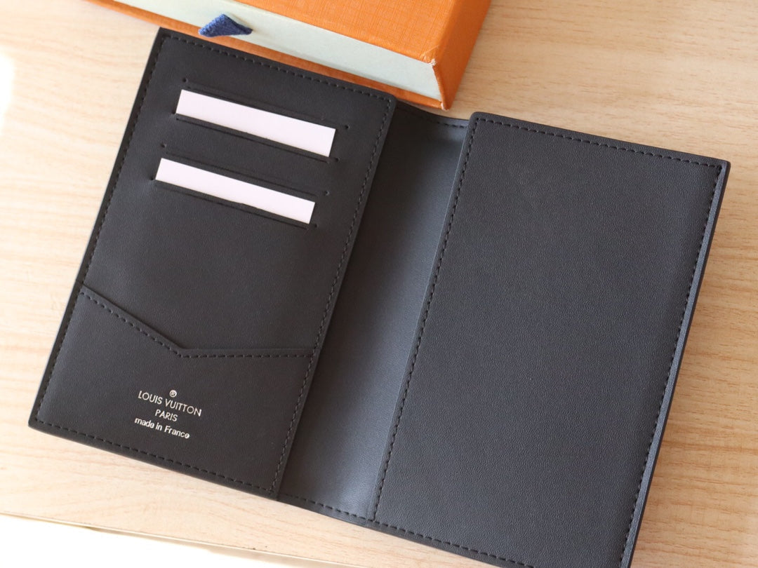 Louis Vuitton 25S Passport Holder 14 in Black Embossed Monogram Shadow Calfskin